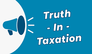 Truth in Taxation with megaphone